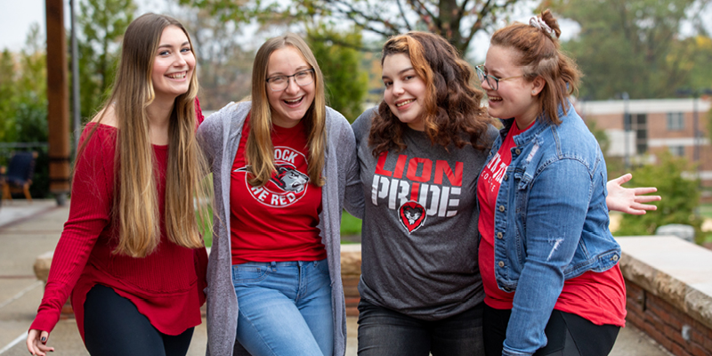 Bryn Athyn College students with arms linked