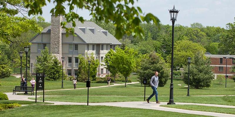 Students walking outside near residence halls at Bryn Athyn College