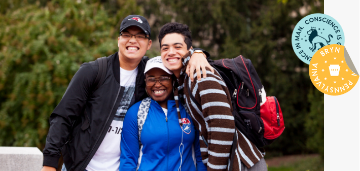 A group of students with their arms around each other