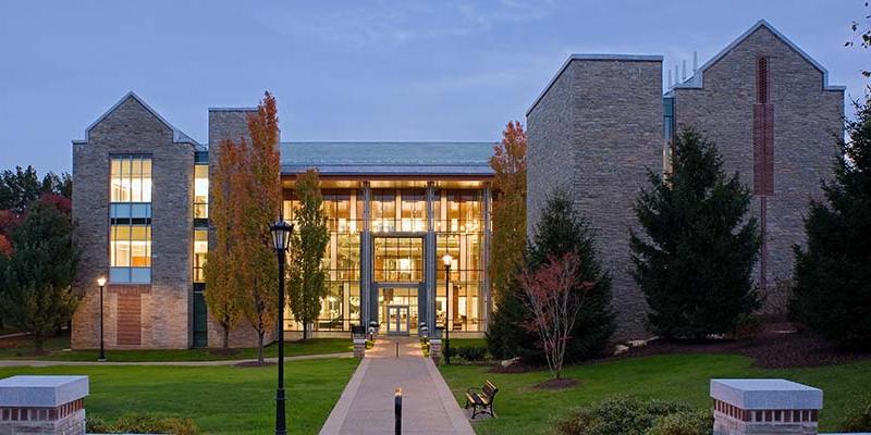 Doering Center with its many windows in the evening at Bryn Athyn College