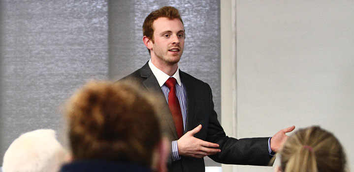 Student makes a professional presentation to classmates at Bryn Athyn College