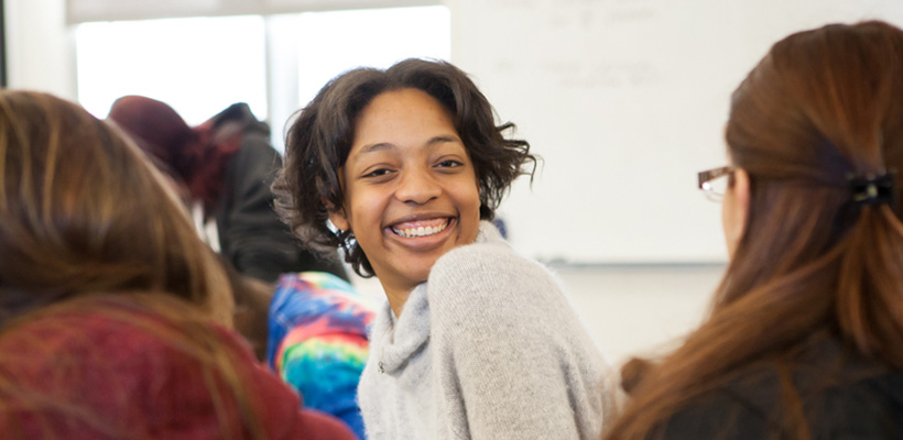Bryn Athyn College female smiling student in the classroom
